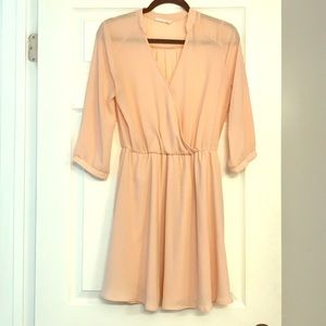 Blush pink knee-length Francesca’s A-line dress!